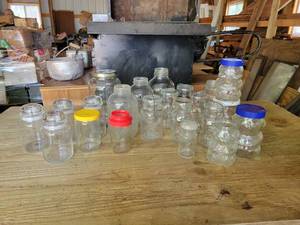 lot 187 image: Lot of Jars - Glass Lid and Wire Bail Quart Ball Jars, Peanut Butter Jars, and More - NO SHIPPING
