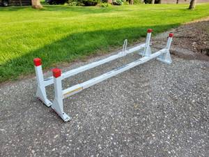 lot 211 image: Weather Guard Ladder Racks