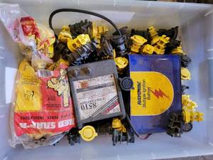 lot 268 image: Tote of Electrical Fence Insulators and More - NO SHIPPING