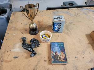 lot 460 image: Vintage Boy Scouts of America Handbook, Brass Trophy Cup, Die Cast Rooster, Earthquake in a Can, and More