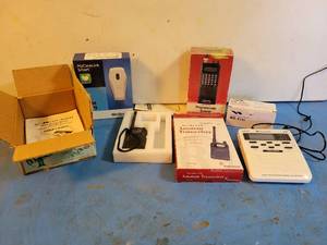 lot 1203 image: NEW Model MH-31 Dynamic Microphone, Radio Shack Transceiver Model HTX-200 (Untested), Medtronic Model 25000 Reader (Untested), Radio Shack Scanner Model 20-305 (Untested) and Midland Weather Monitor Model WR-100 (Powers On)