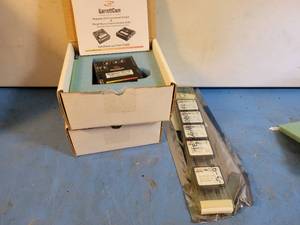 lot 1212 image: (5) NEW Astec AA20B-024L-120S, (2) GarrettCom Magnum PS14P POE Power Sources