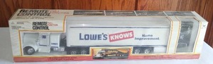 lot 19 image: Lowes Semi Tractor Trailer. Remote Control, NEW IN BOX.