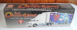 lot 20 image: Texaco 1996 Izzys Olympic Game Car, Toy Carrier Semi. New in Box