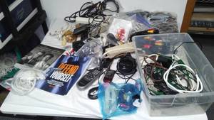 lot 87 image: Cameras, Phones, Electric Strips, RCA Plugs, Cords and More.
