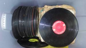 lot 95 image: 10 and 12 in. Record albums - vintage with 18-gallon tote.