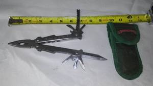 lot 113 image: American camper Leatherman tool.