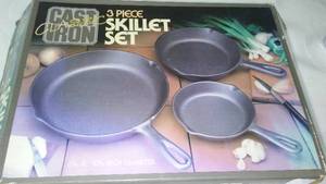 lot 131 image: Cast Iron 3-piece Skillet Set.