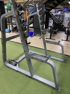Precor half rack squat rack with weight storage