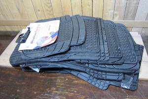 Pile of Mixed Weather Tech car Mats