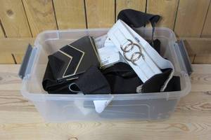 Bin of mixed new fashion belts