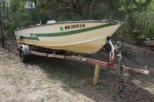 lot 6 image: 1979 Sylvan 16 Aluminum Boat with 70 HP Outboard and Trailer