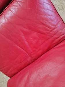lot 33B image: Mark Suess Red Leather Armless Chair and Ottoman