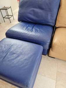 lot 33A image: Mark Suess Blue Leather Armless Chair and Ottoman