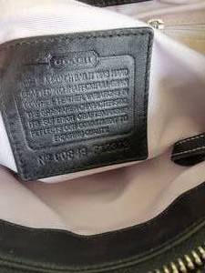 lot 182 image: Black Coach Soho Satchel Handbag  No. G0849-F12803