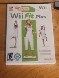 lot 330 image: Nintendo Wii with WiiFit Accessories