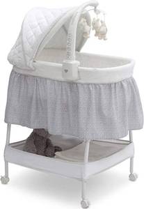 New Delta Children Deluxe Gliding Bassinet