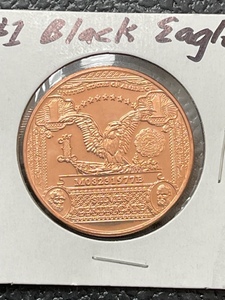 lot 5 image: 1 Ounce .999 Fine Copper $1 Black Eagle Round