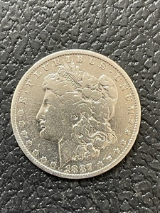 lot 60 image: 1887-O Morgan Dollar