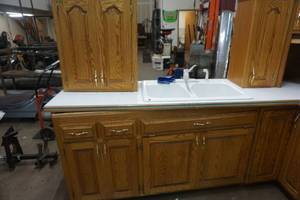lot 28 image: Complete Solid Oak Kitchen Cabinet Set With Refrigerator and Sink