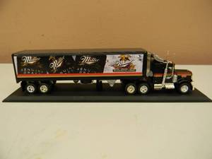 lot 8 image: VINTAGE MATCHBOX 1100 SCALE REPLICA MILLER GENUINE DRAFT PETERBUILT - IN BOX WCOA - NICE - GREAT PIECE - SEE PICTURES