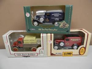 lot 13 image: 3 ANHEUSER BUSCH ERTL 125 SCALE BANKS - 1926 MACK BULLDOG TRUCK BANK WITH CRATES - 1932 FORD PANEL BANK - 32 FORD PANEL DELIVERY BANK - NEW IN BOX - GREAT SET - SEE PICTURES