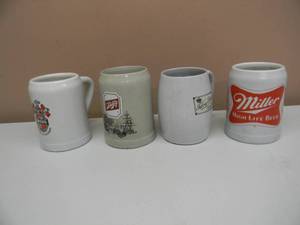 lot 32 image: VINTAGE TUBORG BEER STONEWARE MUG - SCHLITZ BEER STONEWARE MUG - MILLER HIGH LIFE BEER CERAMARTE STONEWARE MUG - BECKs CERAMARTE STONEWARE MUG - GREAT COLLECTION - SEE PICTURES
