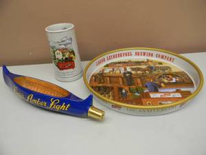 lot 35 image: LEINENKUGELS AMBER LIGHT CANOE TAP HANDLE, NEW IN BOX - APPROX 14 & LEINENKUGELS 13 METAL BEER TRAY & LEINENKUGELS LIMITED EDITION BEER STEIN - AWESOME COLLECTION - SEE PICTURES