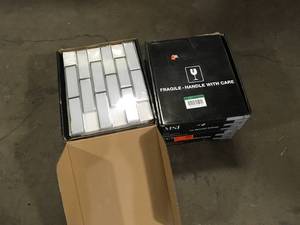 lot 29 image: 4 Boxes of MSI Ice Bevel Subway 11.73 in. x 11.73 in. Glossy Glass Blend Mesh-Mounted Mosaic Tile (9.6 sq. ft.Case) Customer Returns See Pictures