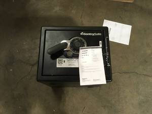 lot 44 image: SentrySafe Fireproof and Waterproof Steel Home Safe with Dial Combination Lock, Secure Documents, Jewelry and Valuables, 0.82 Cubic Feet, 13.7 x 16.3 x 19.3 Inches, SFW082CTB