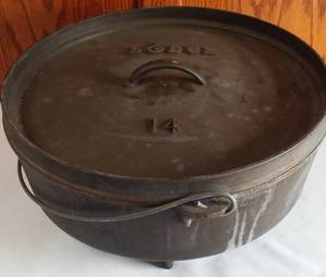lot 43 image: Lodge Cast Covered 3-Legged Pot.