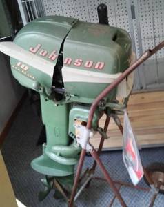 lot 63 image: Johnson Sea Horse 10 Motor with Stand and Gas Tank.