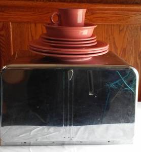 lot 76 image: Beauty Box Bread Box and Fiesta Ware.