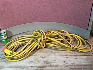 lot 32 image: Super Heavy 10-3 YellowBlack Extension Cord 50ft