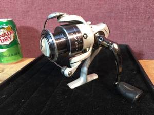 lot 133 image: PFlueger TrioTR130 Spinning Reel