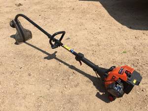 lot 203 image: Remington Rustler Gas Weed WhipTrimmer