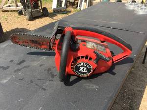 lot 208 image: Homelite XL Small Gas Chainsaw