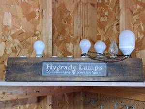 lot 145 image: Vintage Lighted Display - Hygrade Lamps You cannot buy a better lamp