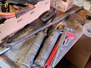 lot 192 image: Hand Tools - Grease Guns, 18 Heavy Duty Pipe Wrench, Pry Bar, Hammer Head