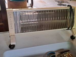 lot 217 image: W.B. Marvin Haolgen Movable Glass Radiant Heater 7530