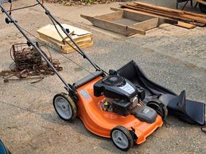 lot 133 image: Husqvarna 21-cut Kohler XT Series XT650 149cc Gas Bagger Lawn Mower LC 121FH