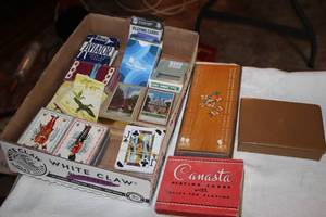 lot 544 image: Cribbage Board with (12) Packs of Playing Cards (in a cardboard flat)