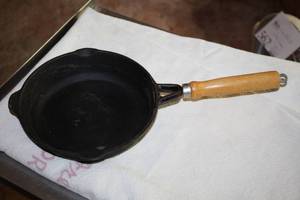 lot 584 image: 8 Cast Iron Skillet with Wood Handle