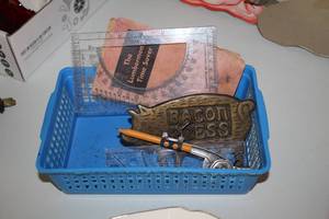 lot 599 image: 6 Bacon Press, Protractor, Compass, The Lumbermen Time Save Book, Blue Plastic Basket
