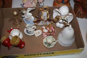 lot 889 image: Lot of (12) Assorted Dcor (in a flat) - Angel Statues, Easter Basket, Mini Cup and Saucer Sets