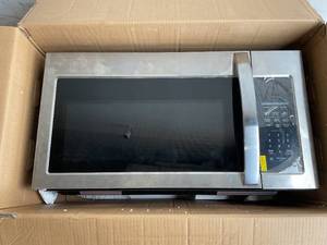 lot 61 image: COSMO 1.9 cu ft. 100W Stainless Steel & Black Over the Range Microwave Oven