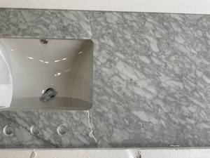 lot 71 image: Home Decorators Collection Cracked Bianco Carrara White Marble Double Basin Vanity Top with Basins