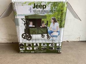 lot 5 image: Jeep Deluxe Black & Green Wrangler Stroller Wagon by Delta Children