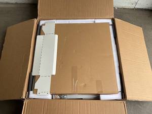 lot 84 image: Fezibo 55-Inch White L-Shaped Electric Height Adjustable Standing Desk