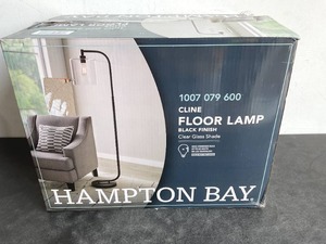 lot 131 image: Hampton Bay 62 .5 in. Black Cline Floor Lamp with Clear Glass Shade